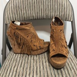 Brown fringe wedges. 5 inch heel.